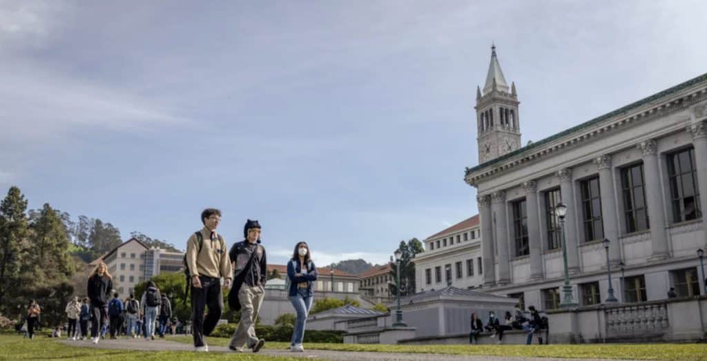Students walkin in a public area on campus.