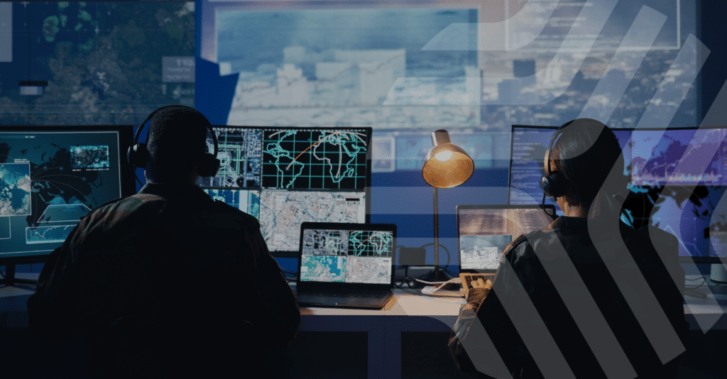 Military personnel manning a communications hub during operations.